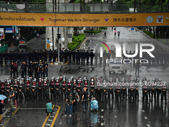 Riot police block street at Ratchaprasong intersection on October 16, 2020 in Bangkok, Thailand. After Thailand issued an emergency decree i...