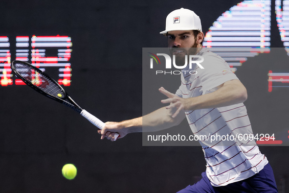 Reilly Opelka of United States returns the ball to Borna Coric of Croatia during their ATP St. Petersburg Open 2020 international tennis tou...