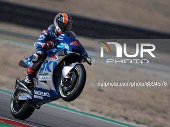 Alex Rins (42) of Spain and Team Suzuki Ecstar making a wheelie during the free practice for the MotoGP of Aragon at Motorland Aragon Circui...