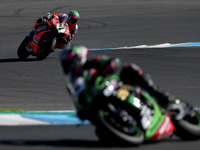 British Chaz Davies (L) of Aruba.It Racing - Ducati rides during the free practices ahead of the FIM Superbike World Championship - WorldSBK...