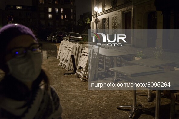 Paris prepares for a nightly curfew to face the coronavirus pandemic as bar and restaurant owners fear for their businesses, in Paris, Franc...