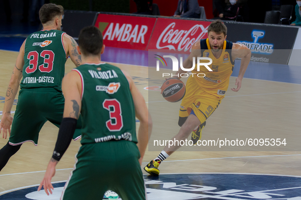 Egor Vialtsev ,#9 of Khimki Moscow competes with Achille Polonara, #33 of Baskonia Vitoria Gasteiz action during the 2020/2021 EuroLeague Re...
