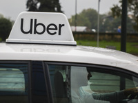 Logo of Uber taxi car is pictured outdoors in Krakow, Poland, on October 16th, 2020.   (