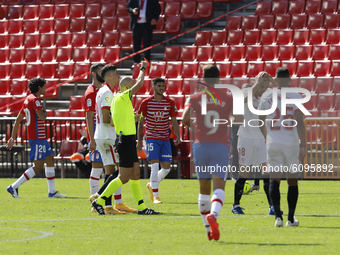 Joan Jordan of Sevilla FC sees the red card during the La Liga match between Granada CF and Sevilla FC at Nuevo Los Carmenes Stadium on Octo...