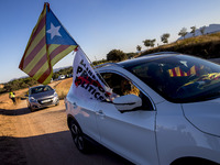 More than 1000 vehicles in demonstration surround the Lledoners Penitentiary Center where Catalan pro-independence political prisoners are r...