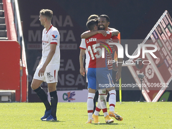 Yangel Herrera and Carlos Neva, of Granada CF , celebrates the victory during the La Liga match between Granada CF and Sevilla FC at Nuevo L...