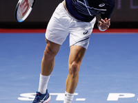 Borna Coric of Croatia serves the ball during his ATP St. Petersburg Open 2020 international tennis tournament semi-final match against Milo...