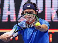 Milos Raonic of Canada serves the ball during his ATP St. Petersburg Open 2020 international tennis tournament semi-final match against Born...