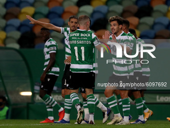 Nuno Santos of Sporting CP celebrates with teammates after scoring during the Portuguese League football match between Sporting CP and FC Po...