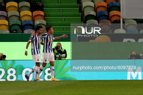 Matheus Uribe of FC Porto celebrates with Luis Diaz (L ) after scoring a goal  during the Portuguese League football match between Sporting...