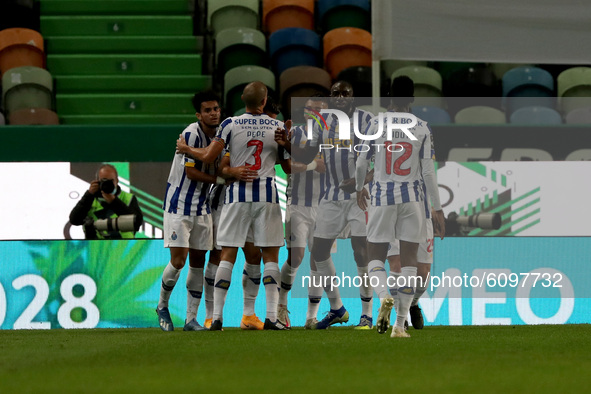 Matheus Uribe of FC Porto celebrates with teammates after scoring during the Portuguese League football match between Sporting CP and FC Por...
