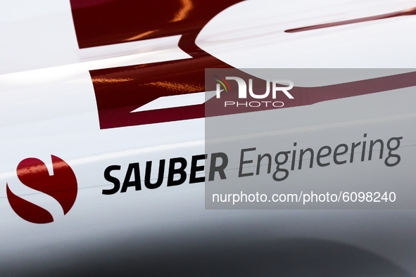 Sauber Engineering logo is seen on the Formula 1 car Sauber C-37 in the livery of Alfa Romeo Racing-Ferrari, in the showcase at a gas statio...