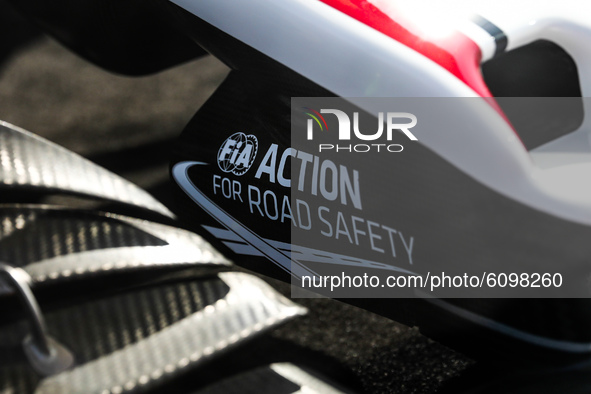 FIA Action for Road Safety logo is seen on the Formula 1 car Sauber C-37 in the livery of Alfa Romeo Racing-Ferrari, in the showcase at a ga...