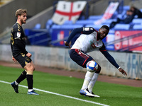 Bolton Wanderers' Ricardo Santos ands Oldham Athletic's Conor McAleny in action during the Sky Bet League 2 match between Bolton Wanderers a...