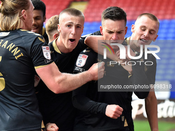 Oldham Athletic's Zak Dearnley celebrates scoring the winning goal during the Sky Bet League 2 match between Bolton Wanderers and Oldham Ath...