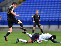 Bolton Wanderers' Brandon Comley ands Oldham Athletic's Ben Garrity in action during the Sky Bet League 2 match between Bolton Wanderers and...