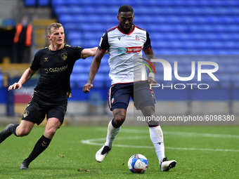 Bolton Wanderers' Ricardo Santos ands Oldham Athletic's Danny Rowe in action during the Sky Bet League 2 match between Bolton Wanderers and...