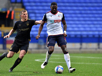 Bolton Wanderers' Ricardo Santos ands Oldham Athletic's Danny Rowe in action during the Sky Bet League 2 match between Bolton Wanderers and...
