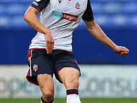  Boltons Ryan Delaney plays the ball forward during the Sky Bet League 2 match between Bolton Wanderers and Oldham Athletic at the Reebok St...