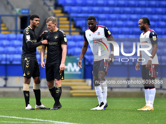 Bolton Wanderers' Ricardo Santos and Nathan Delfouneso ands Oldham Athletic's Kyle Jameson and Danny Rowe in action during the Sky Bet Leagu...