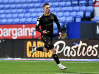 Oldham Athletic's Zak Dearnley celebrates scoring the winning goal during the Sky Bet League 2 match between Bolton Wanderers and Oldham Ath...