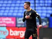 Oldham Athletic's Zak Dearnley celebrates scoring his sides winning goal during the Sky Bet League 2 match between Bolton Wanderers and Oldh...