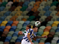 Joao Palhinha of Sporting CP (L) vies with Matheus Uribe of FC Porto during the Portuguese League football match between Sporting CP and FC...