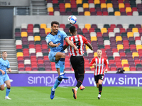  Josh Pask, Rico Henry during the Sky Bet Championship match between Brentford and Coventry City at Brentford Community Stadium on October 1...