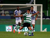 Matheus Nunes of Sporting CP (C ) vies with Sergio Oliveira of FC Porto during the Portuguese League football match between Sporting CP and...