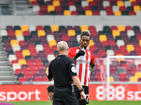  Ivan Toney, Andy Woolmer during the Sky Bet Championship match between Brentford and Coventry City at Brentford Community Stadium on Octobe...