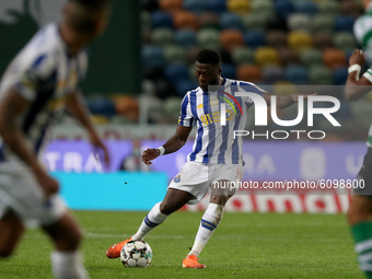 Mbemba of FC Porto in action during the Portuguese League football match between Sporting CP and FC Porto at Jose Alvalade stadium in Lisbon...