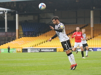 David Worrall of Port Vale heads the ball during the Sky Bet League 2 match between Port Vale and Salford City at Vale Park, Burslem, Englan...
