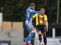 Patrick Brough of Barrow contests a header with Jack Muldoon of Harrogate Town during the Sky Bet League 2 match between Harrogate Town and...