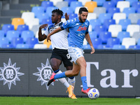 Duvan Zapata of Atalanta BC and Konstantinos Manolas of SSC Napoli compete for the ball during the Serie A match between SSC Napoli and Atal...