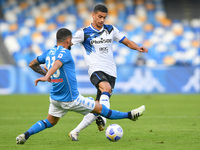 Fabio Depaoli of Atalanta BC and Elseid Hysaj of SSC Napoli compete for the ball during the Serie A match between SSC Napoli and Atalanta BC...