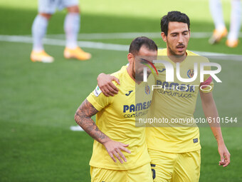 Paco Alcacer and Dani Parejo of Villarreal CF celebrates a goal during the La Liga Santander mach between Villarreal and Valencia at Estadio...