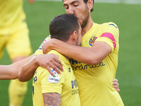 Paco Alcacer and Dani Parejo of Villarreal CF celebrates a goal during the La Liga Santander mach between Villarreal and Valencia at Estadio...