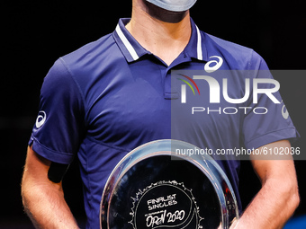 Borna Coric of Croatia with his trophy after his ATP St. Petersburg Open 2020 international tennis tournament final against Andrey Rublev of...