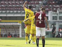 Giovanni Simeone of Cagliari Calcio celebrates with teammates after scoring during the Serie A football match between Torino FC and Cagliari...
