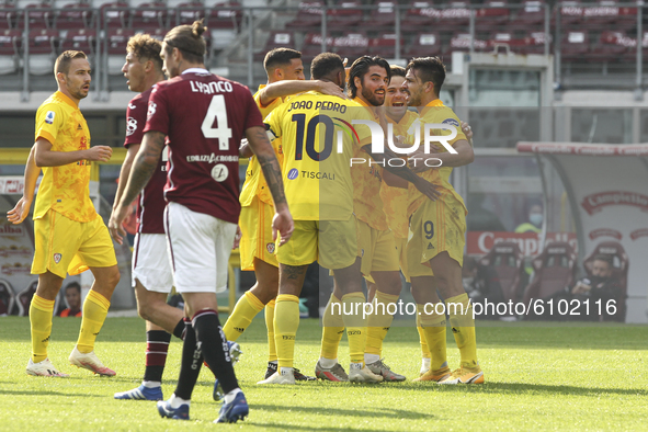 Giovanni Simeone of Cagliari Calcio celebrates with teammates after scoring during the Serie A football match between Torino FC and Cagliari...