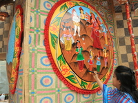 Artist is giving finishing touch to Pattachitra panting a decorations set up ahed of the hindu Festival Durga Puja in Kolkata, India on Octo...