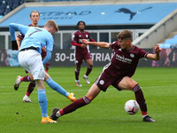  Citys Cole Palmer has a shot during the Premier League 2 match between Manchester City and Leicester City at the  Academy Stadium, Manchest...
