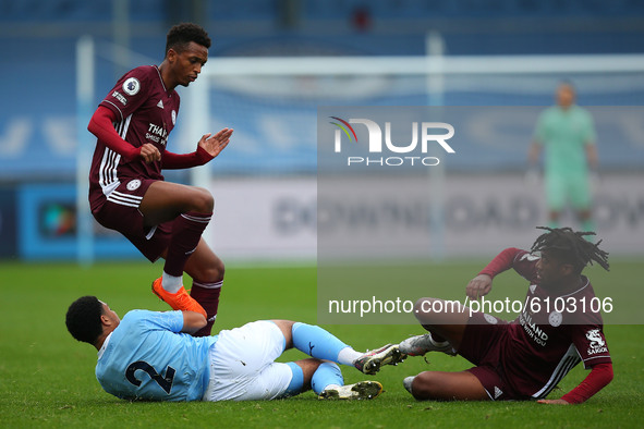  Citys CJ Egan-Riley slides in on Leicester’s Tyrese Shade during the Premier League 2 match between Manchester City and Leicester City at t...