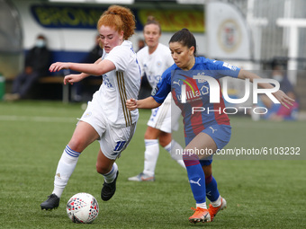 L-R Annabel Blanchard of Leicester City Women holds of Ffion Morgan of Crystal Palace Women during FA Women's Championship between Crystal P...
