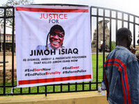 Protesters attending Sunday services next to a banner demanding justice for “JIMOH ISIAQ” who was killed in an #EndSARS protest in the Ogbom...