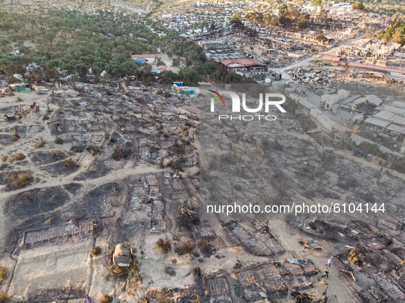 Panoramic view from a drone of the aftermath of the first fire in Moria Refugee camp and the nearby olive groves. Thousands of asylum seeker...