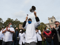 Hundreds of hospitality workers take part in a demonstration in Parliament Square against the lack of scientific evidence behind the new cor...