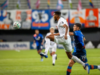 Cincinnati forward, Brandon Vazques, and D.C. United defender, Donovan Pines, compete for the ball in front of the goal during an MLS soccer...