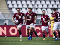 Torino forward Andrea Belotti (9) celebrates with his teammates after scoring his goal to make it 2-2 during the Serie A football match n.4...