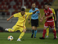 Alexandru Matan of Romania U21 in action during  the soccer match between Romania U21 and Malta U21 of the Qualifying Round for the European...